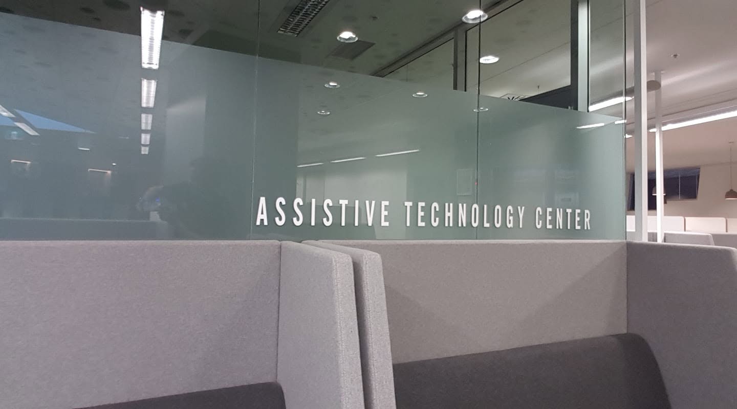 Frosted film and glazing letters for an assistive technology centre