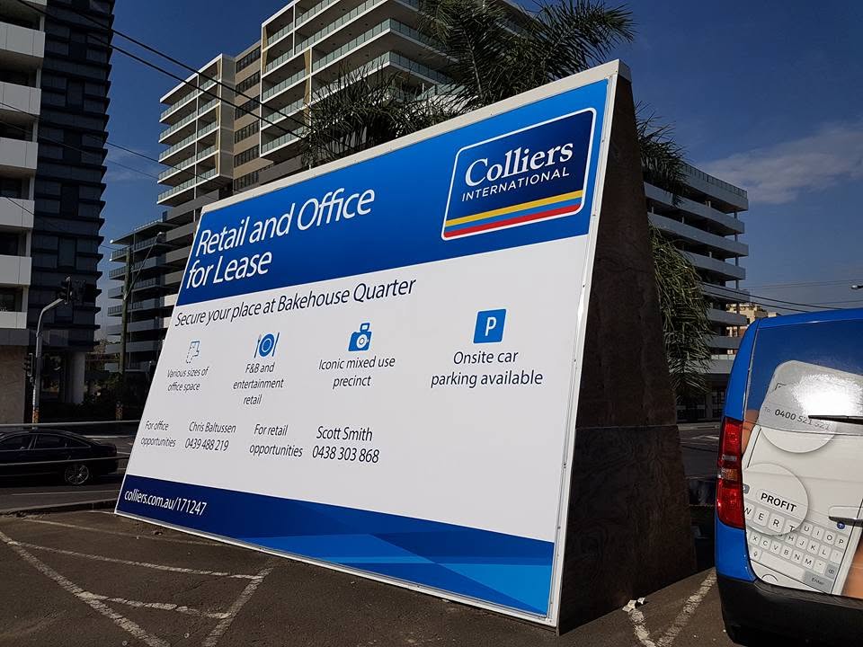 Printed site lease billboard for Colliers International